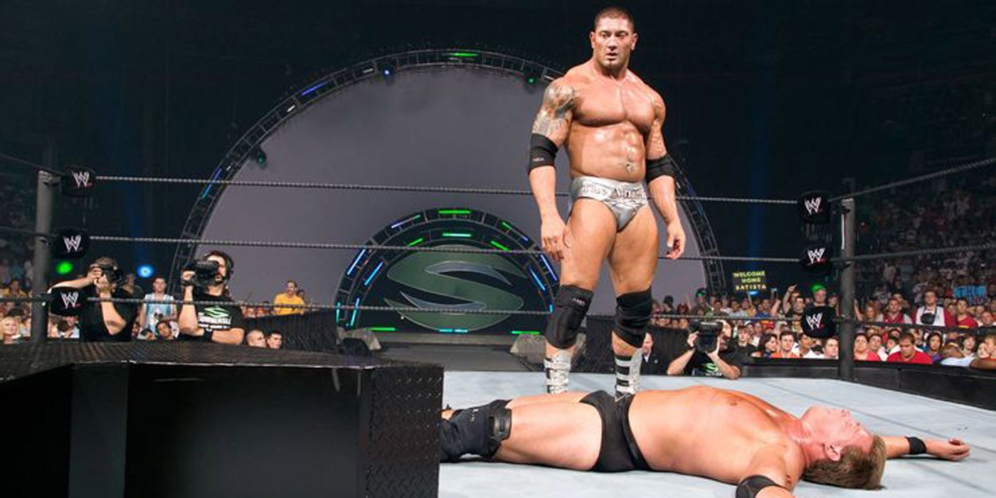 Batista vs JBL in WWE.