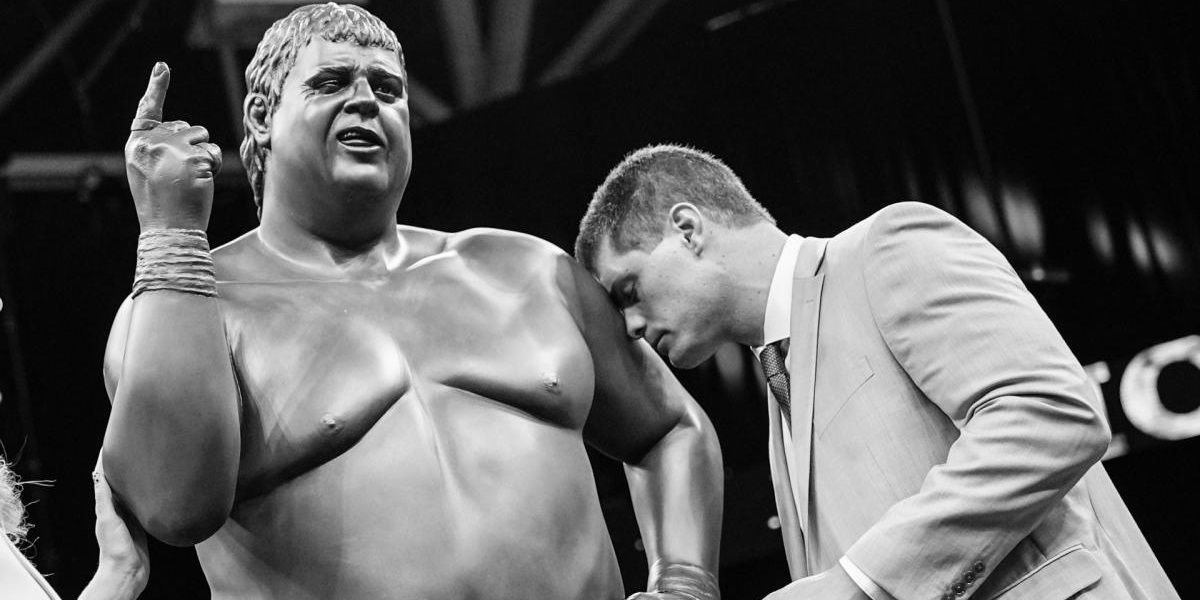 Cody Rhodes with his father's statue 