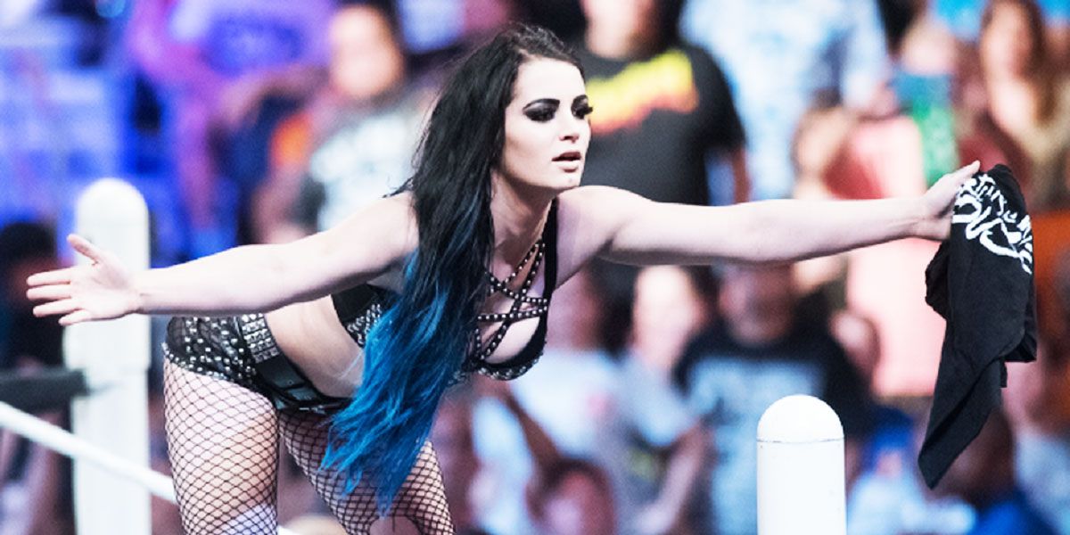Paige posing on the top turnbuckle