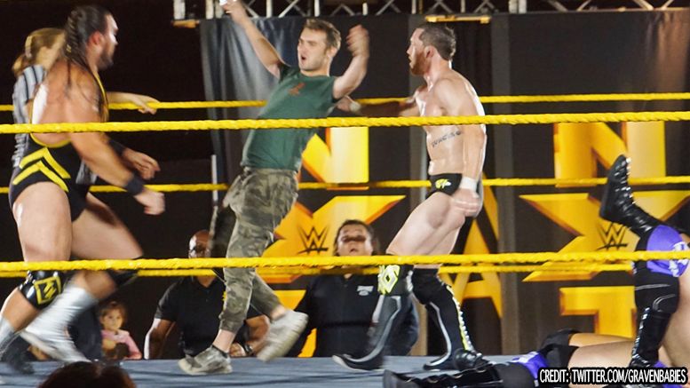 nxt live event fan jump into ring video