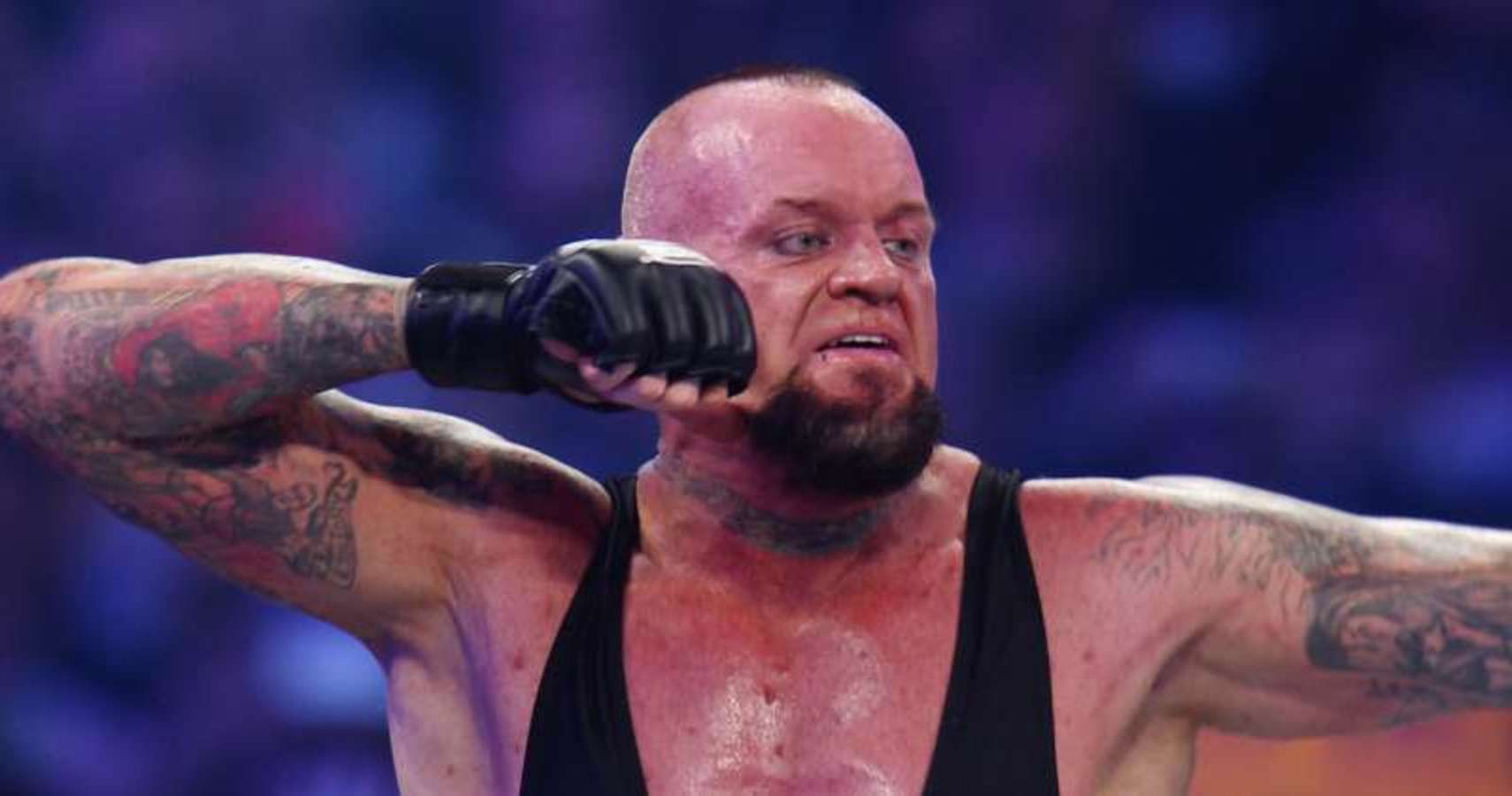 Undertaker Attacks Post Malone & Smashes Guitar During Concert