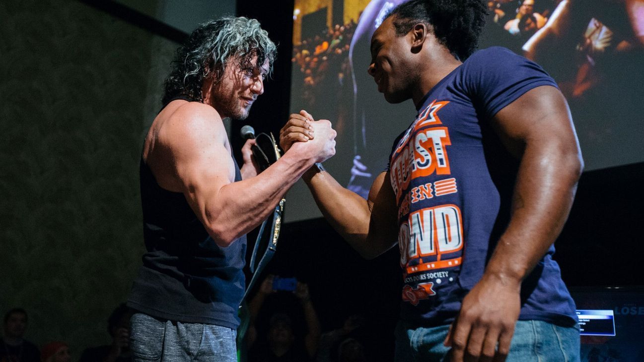 Kenny Omega and Xavier Woods
