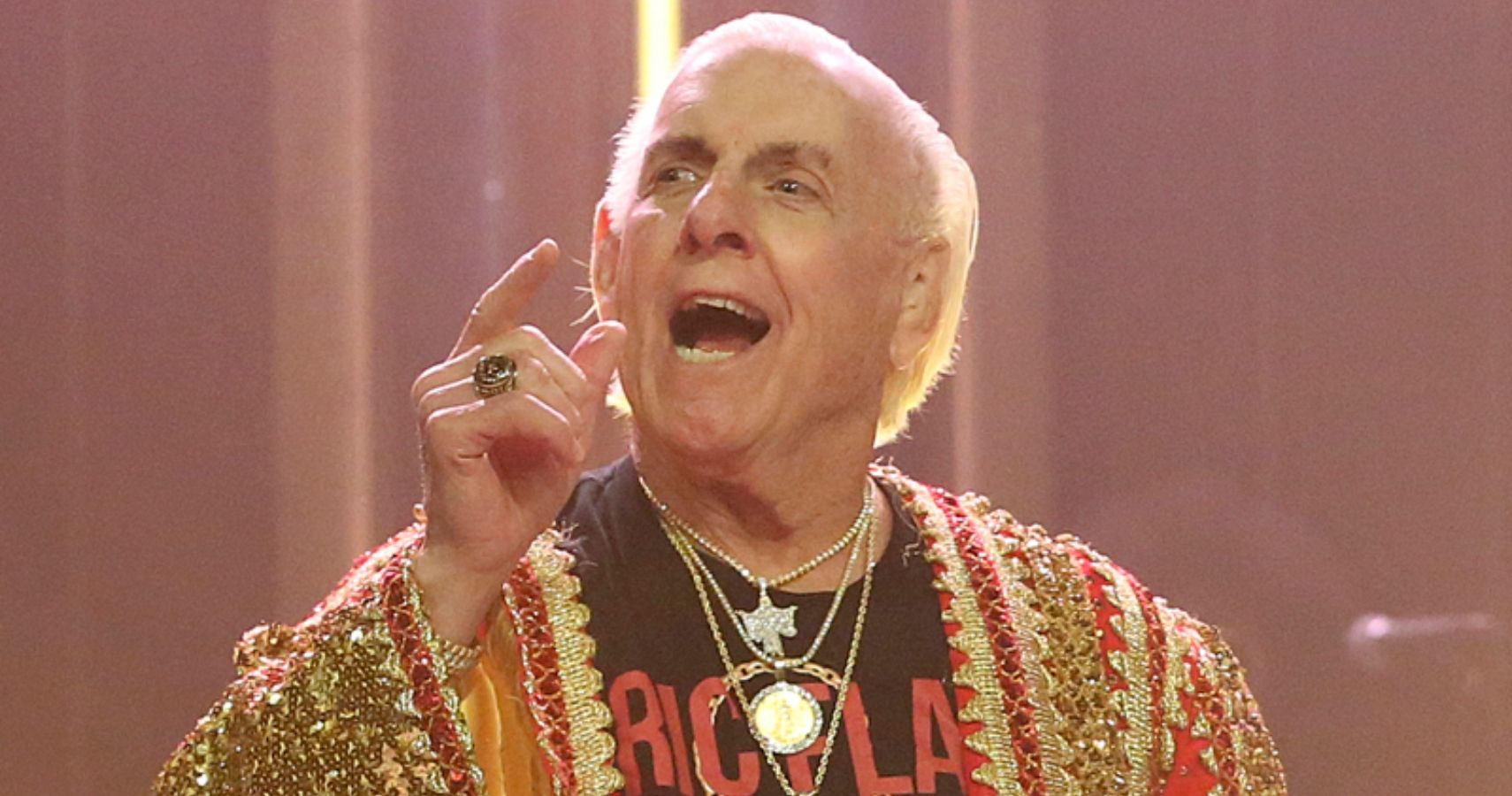 9. Ric Flair's Matching "Space Mountain" Tattoos with Shawn Michaels - wide 6