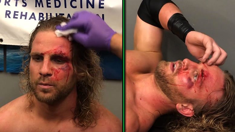 hangman adam page chris jericho attack fight for the fallen footage medical attention