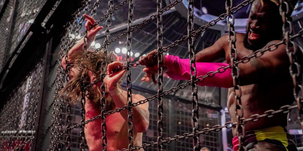 Kofi Kingston throws Daniel Bryan into the Elimination Chamber