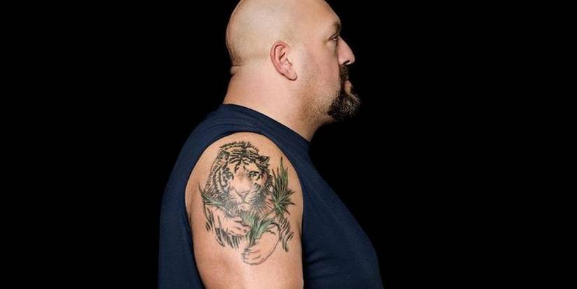 10 Tattoos The Men Of WWE Have (& What They Mean)