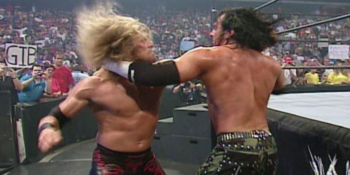 Edge and Matt Hardy brawling 