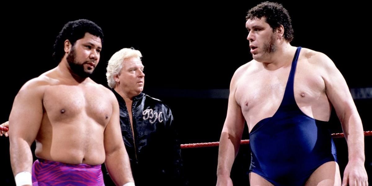 Bobby Heenan standing with Andre and Haku.