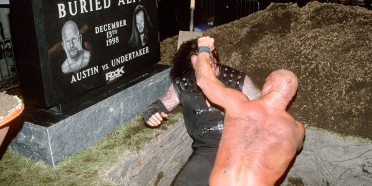 Austin fights Undertaker in a grave