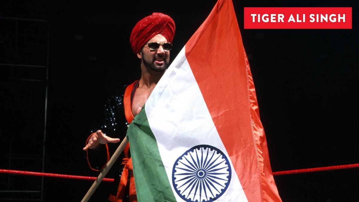 Tiger Ali Singh holding the Indian flag