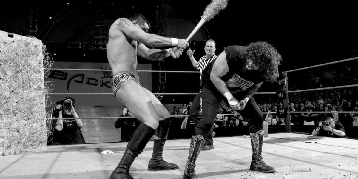 Randy Orton hitting Cactus Jack