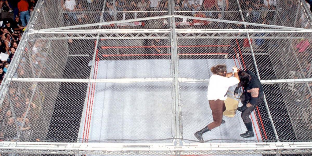 Mankind Battling Undertaker Atop The Cell