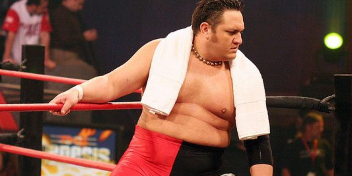 A photo of Samoa Joe looking out into the crowd before entering the ring. 