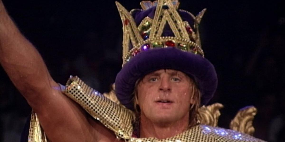 Owen Hart celebrating after winning the King of the Ring tournament