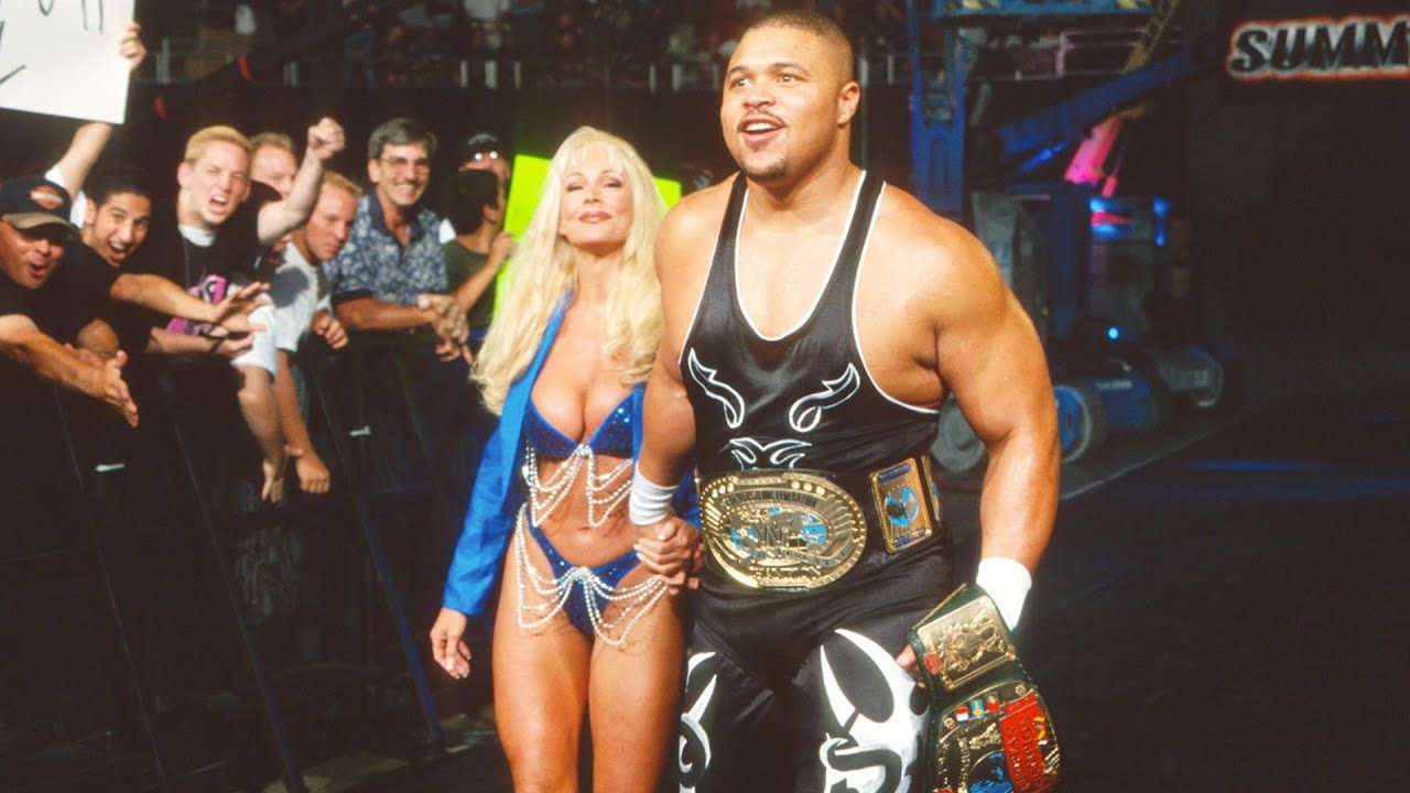 Debra accompanying double champion D-Lo Brown to the ring at SummerSlam