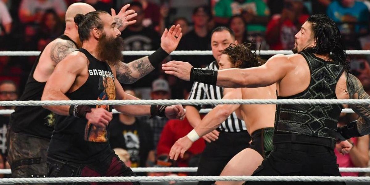Luke Harper and Erik Rowan battling Roman Reigns and Daniel Bryan