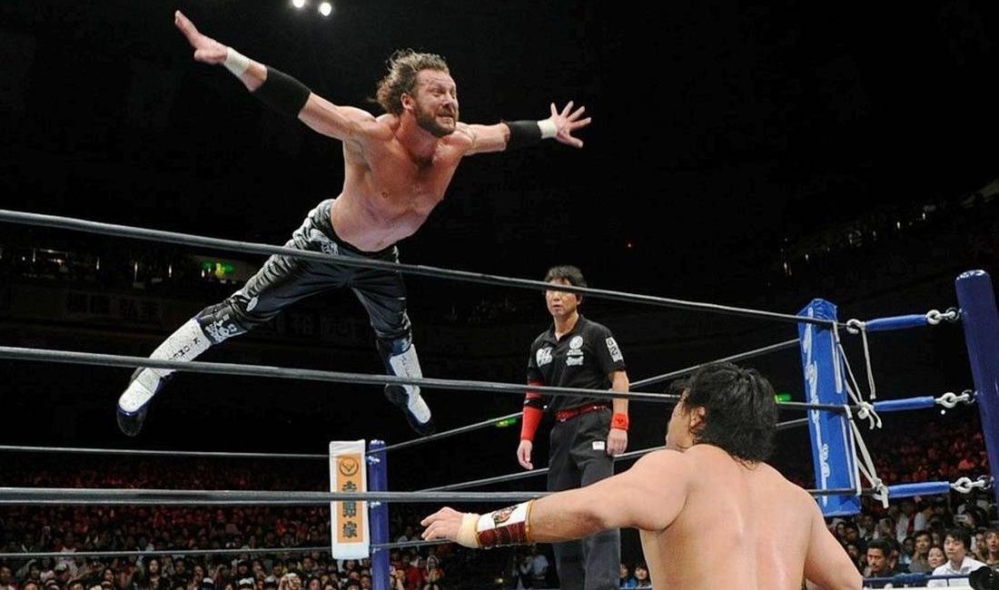 Kenny Omega takes flight during the G1