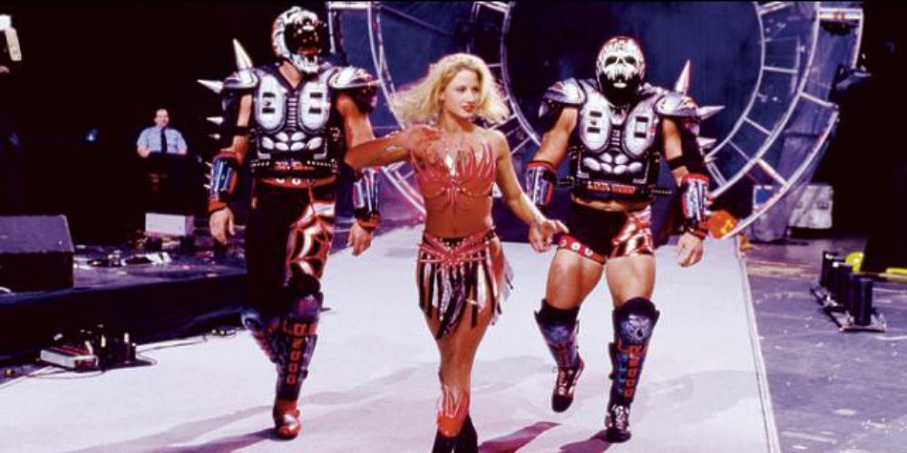 Legion Of Doom and Sunny walking down to the ring at WrestleMania XV.
