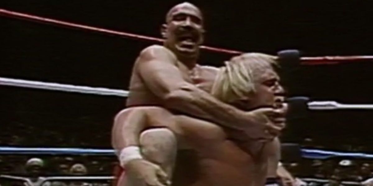 The Iron Sheik puts Hulk Hogan in the Camel Clutch