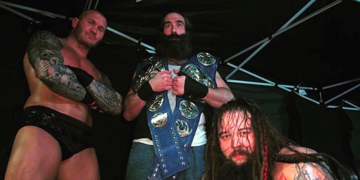 Luke Harper Posing Along With Randy Orton And Bray Wyatt