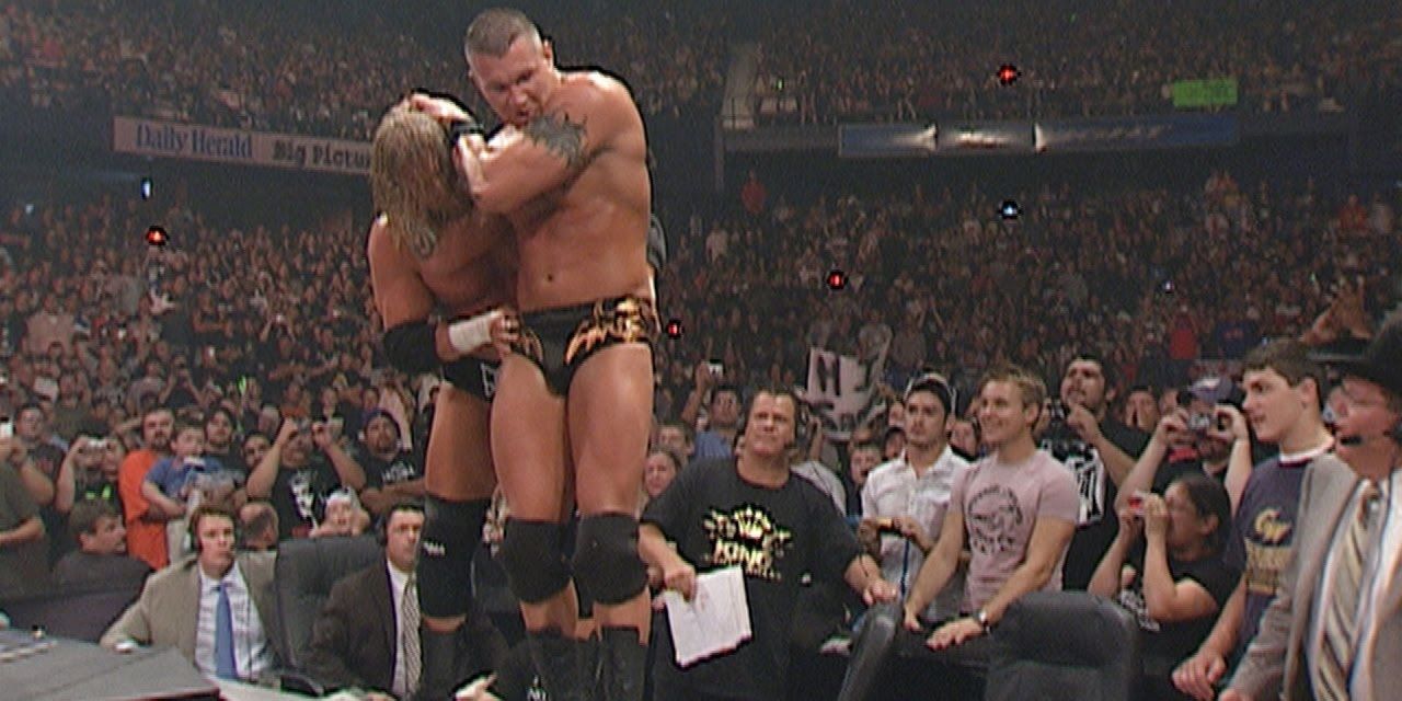 Randy Orton and Triple H fighting for the WWE Championship at No Mercy 2007 in a Last Man Standing match