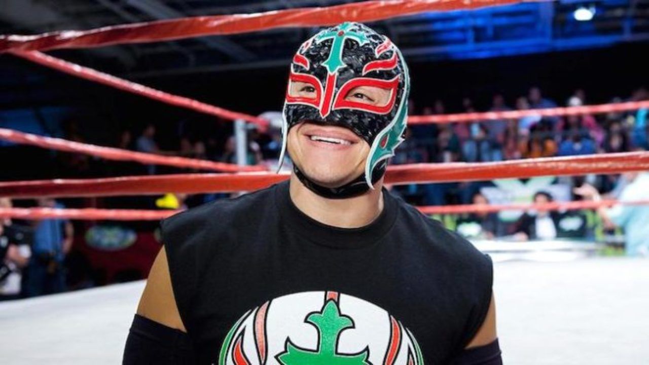 Rey Mysterio Standing At Ringside Smiling