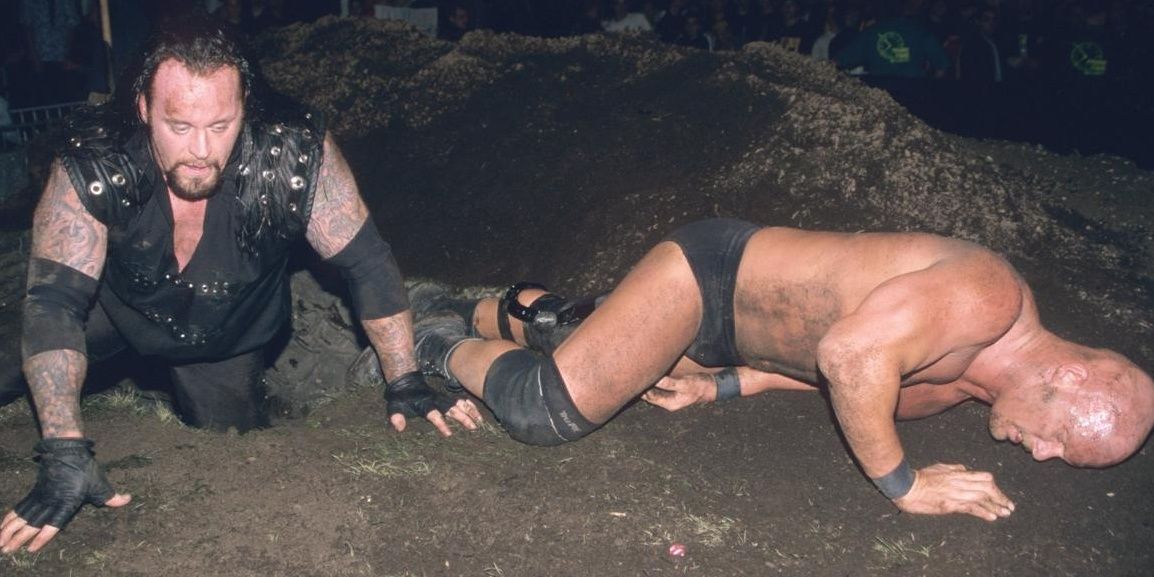 Undertaker and Steve Austin collide in a Buried Alive Match