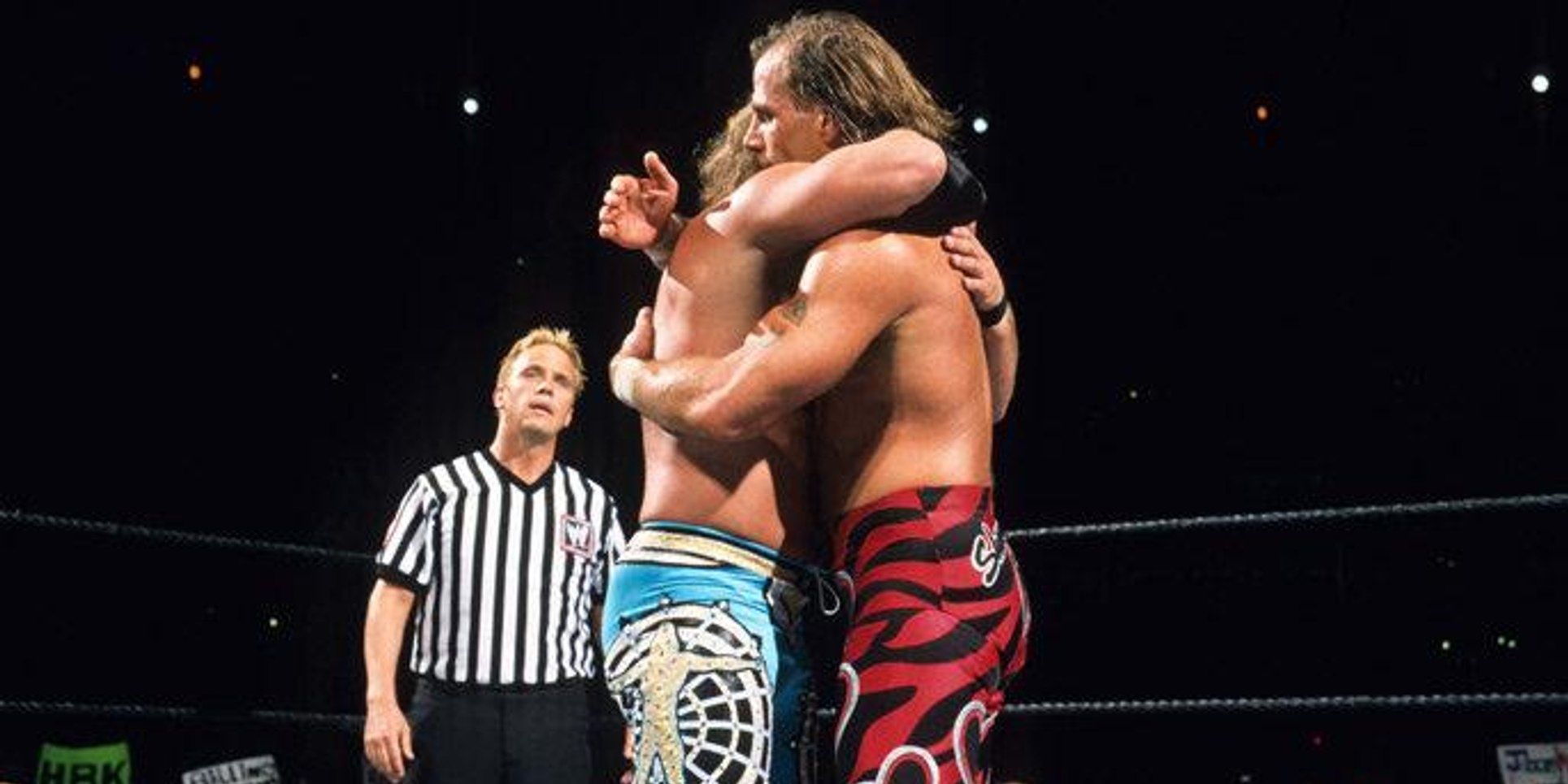 WWE Chris Jericho And Shawn Michaels Hugging In The Ring At WrestleMania 19