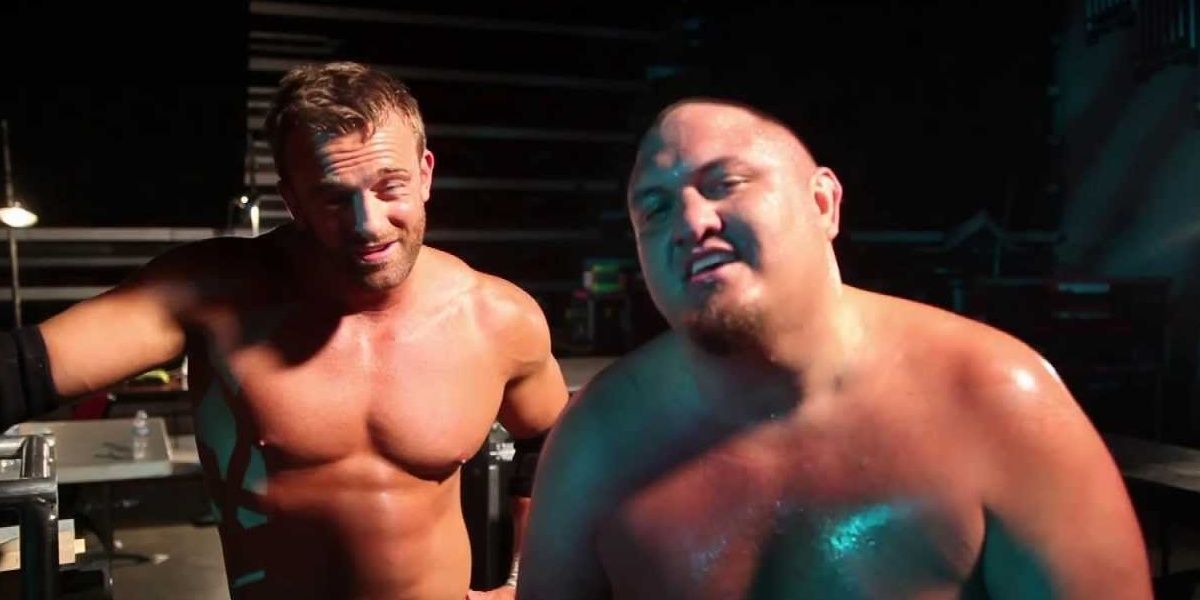 A photo of Magnus and Samoa Joe posing after a match.