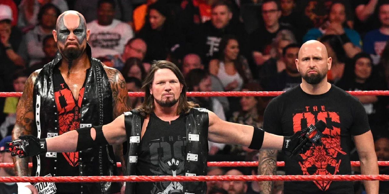 AJ Styles poses with The Club