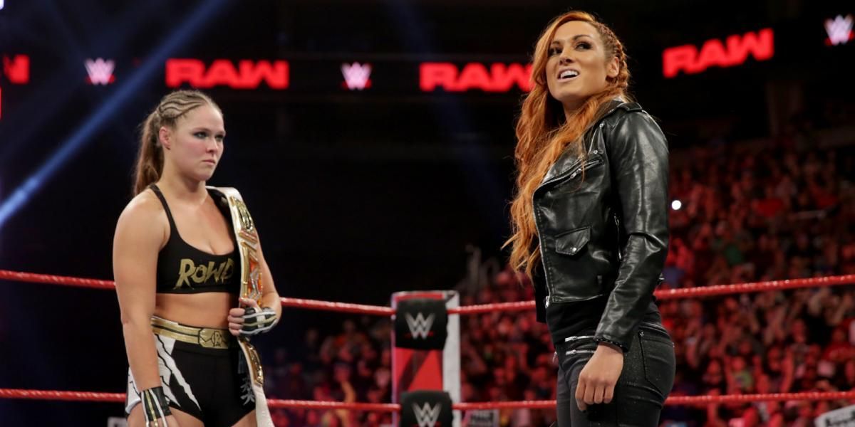 https://static0.thesportsterimages.com/wordpress/wp-content/uploads/2020/10/Becky-Lynch-Ronda-Rousey-WrestleMania-35.jpg