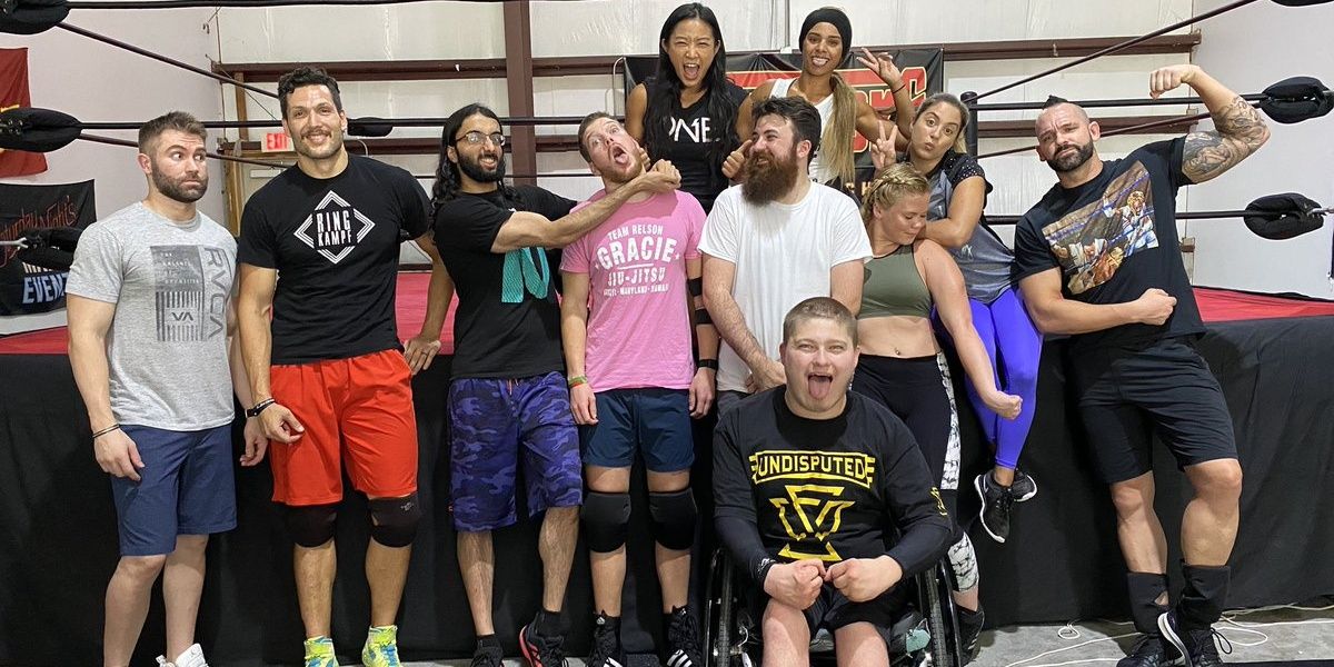 Tyler Breeze with a fresh crop of recruits