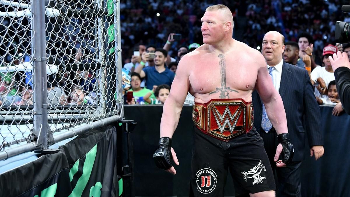 WWE Brock Lesnar Walking Around Ring With Steel Cage Wearing Universal Championship