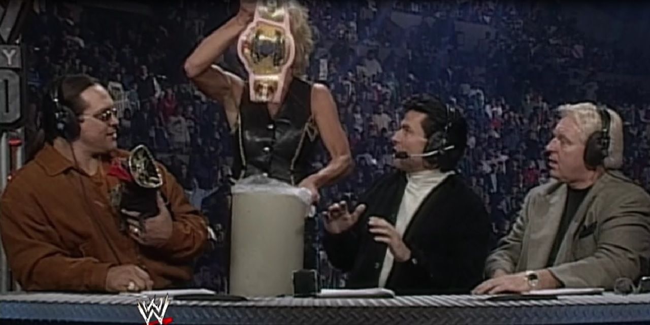 Madusa throws WWE belt in trash