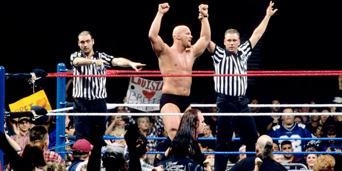 Steve Austin celebrates a Royal Rumble win