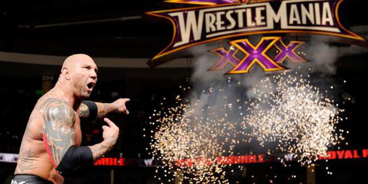 Batista pointing at the WrestleMania sign after winning the 2014 Royal Rumble winner match.