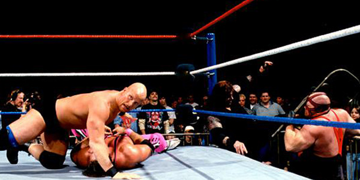 Austin beats on Bret while Vader brawls with Undertaker