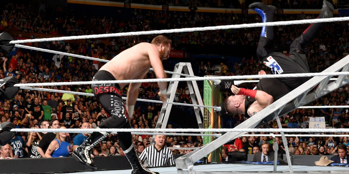 Sami Zayn slams Kevin Owens onto a ladder