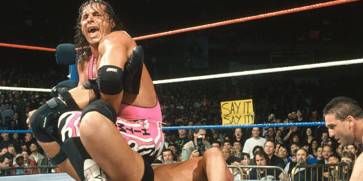 Bret Hart puts Stone Ccld in a Sharpshooter