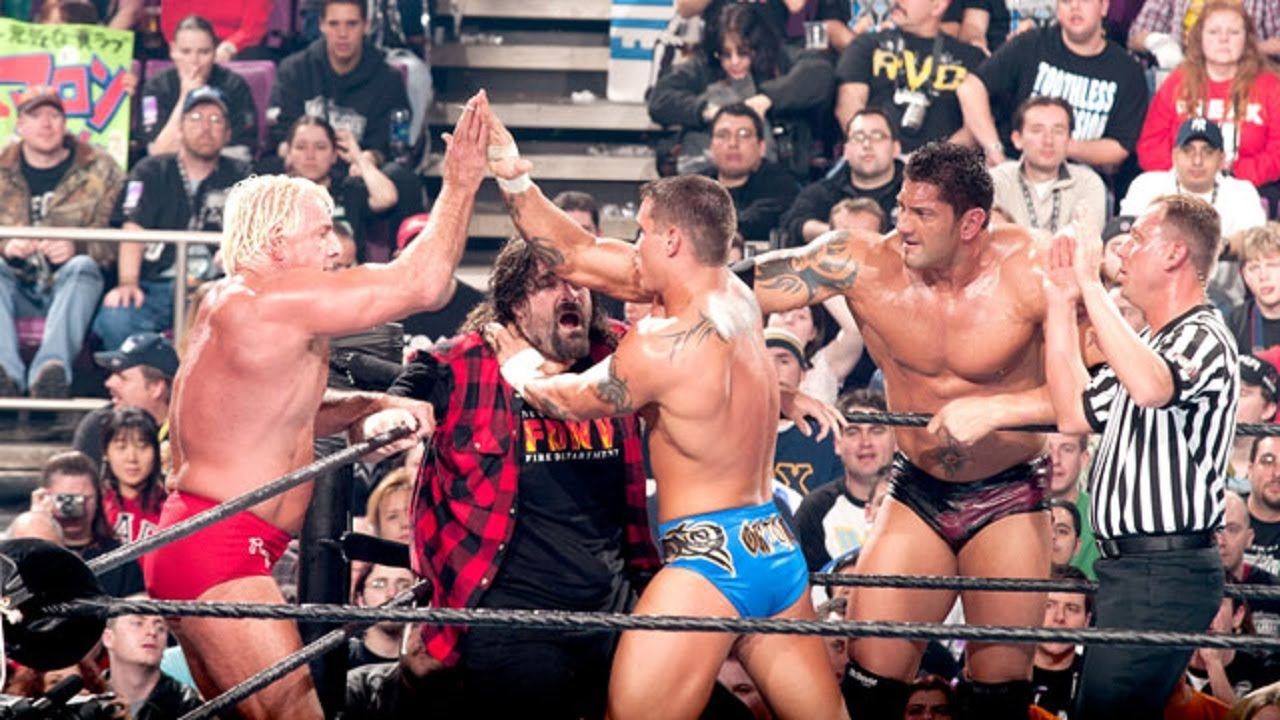 WWE Randy Orton Tagging In Ric Flair In A Tag Match With Batista Against Mick Foley