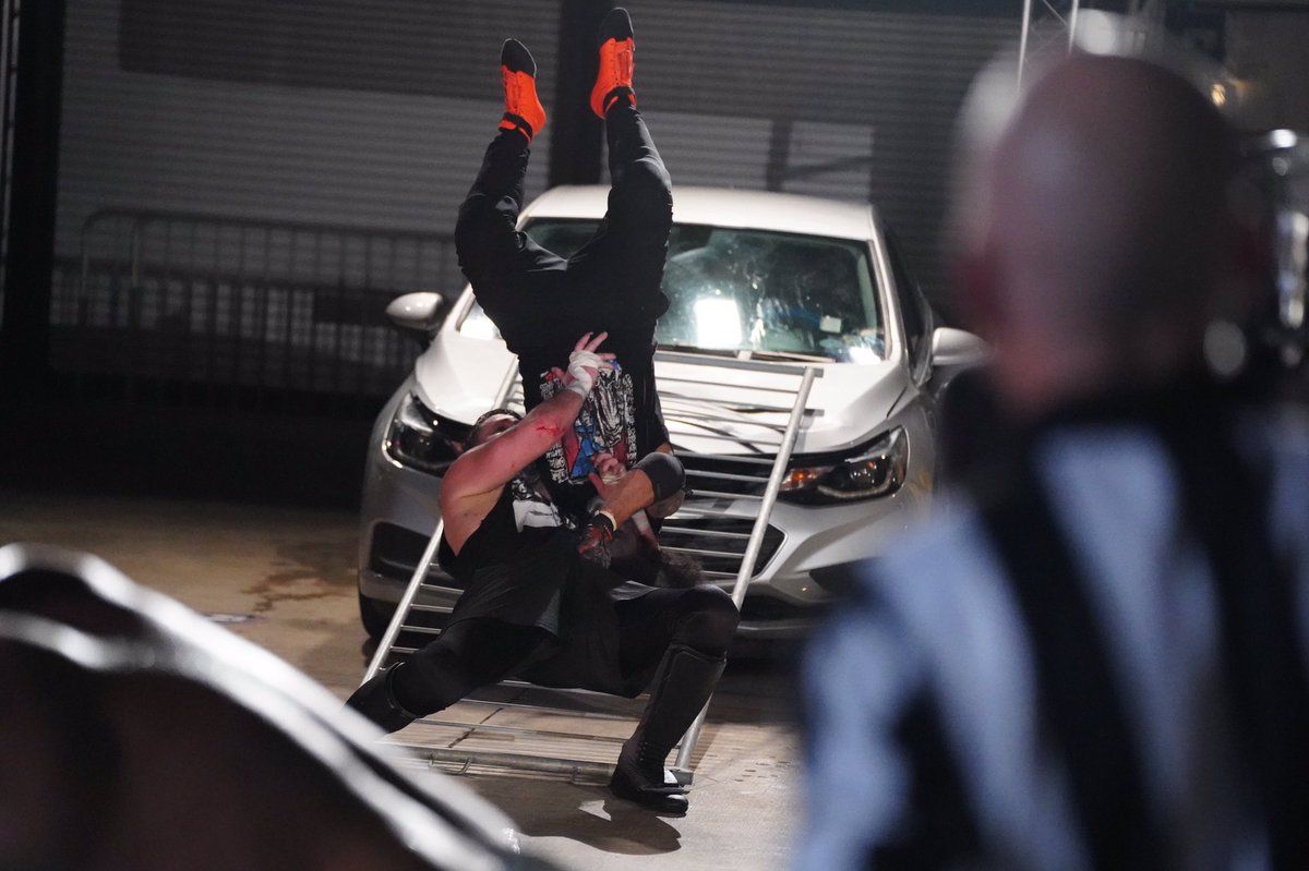 AEW Chuck Taylor Suplexing Santana Onto A Steel Barricade