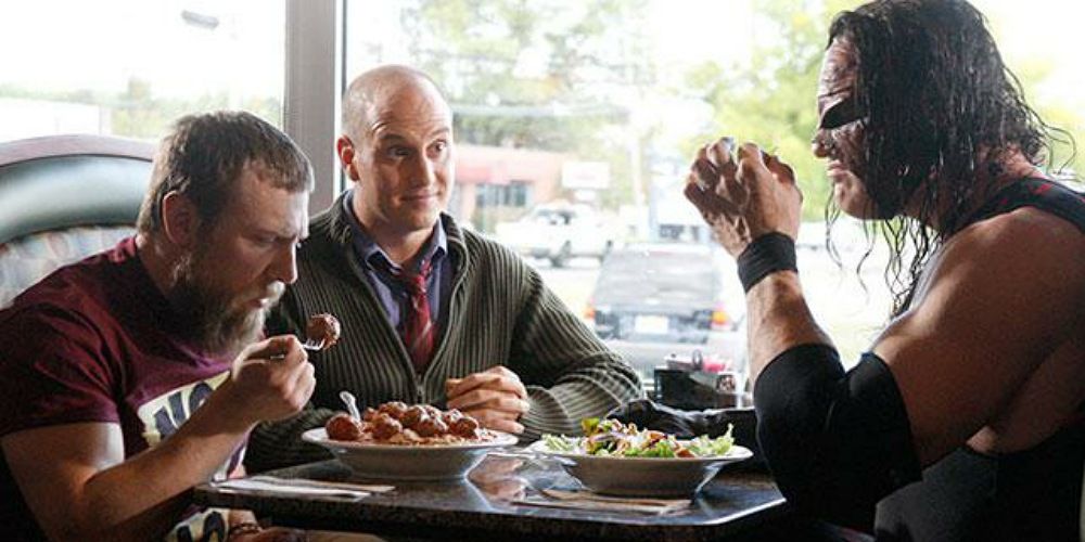 Daniel Bryan and Kane having breakfast with Dr. Shelby.