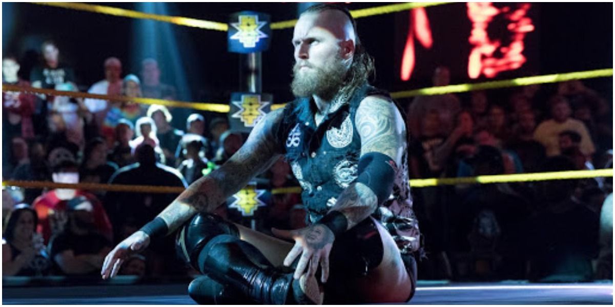 WWE Aleister Black Sitting In The Ring During His Entrance