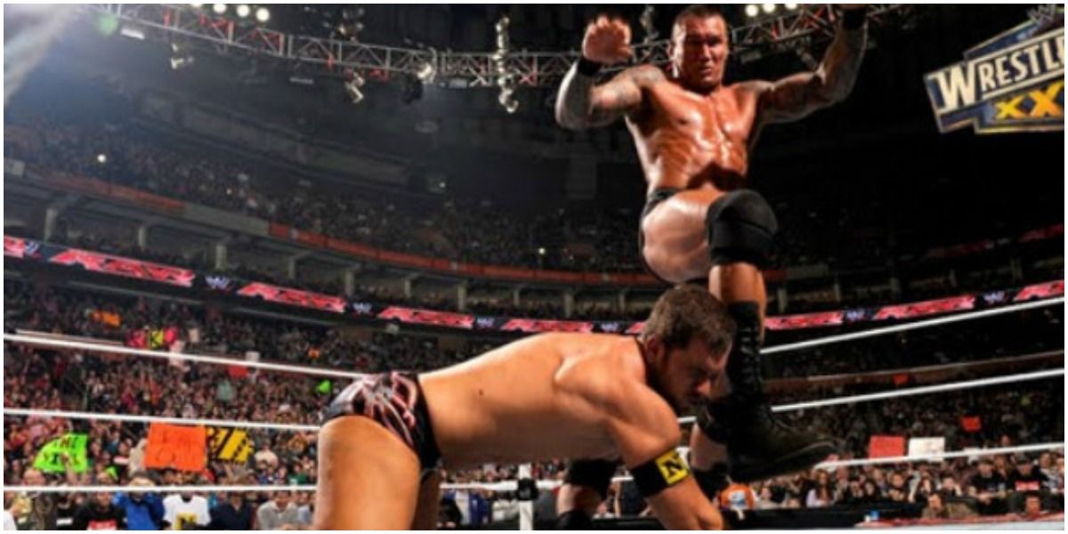 WWE Randy Orton Delivering A Punt To Curtis Axel