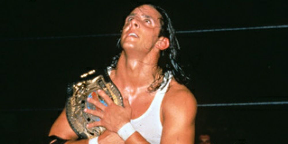 Billy Kidman embracing the WCW Cruiserweight Championship.