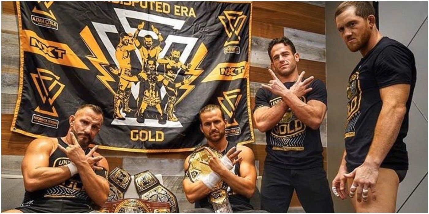 The Undisputed Era posing backstage at NXT