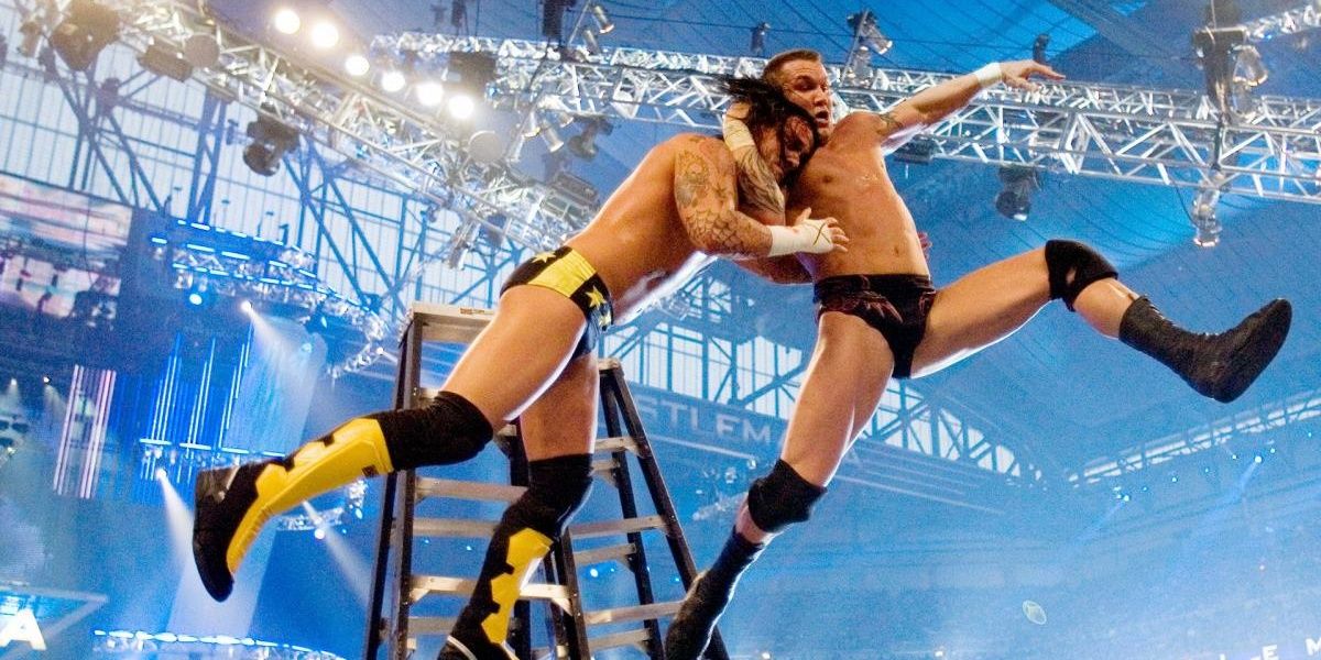 Randy Orton RKO's CM Punk off a ladder