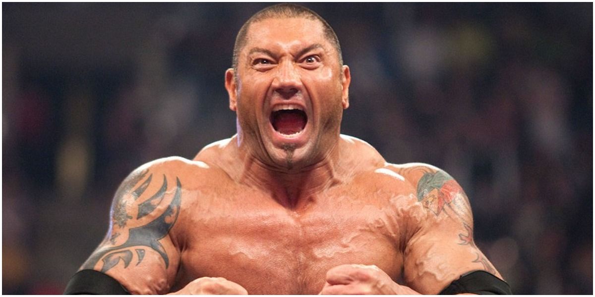 Batista flexing in ring