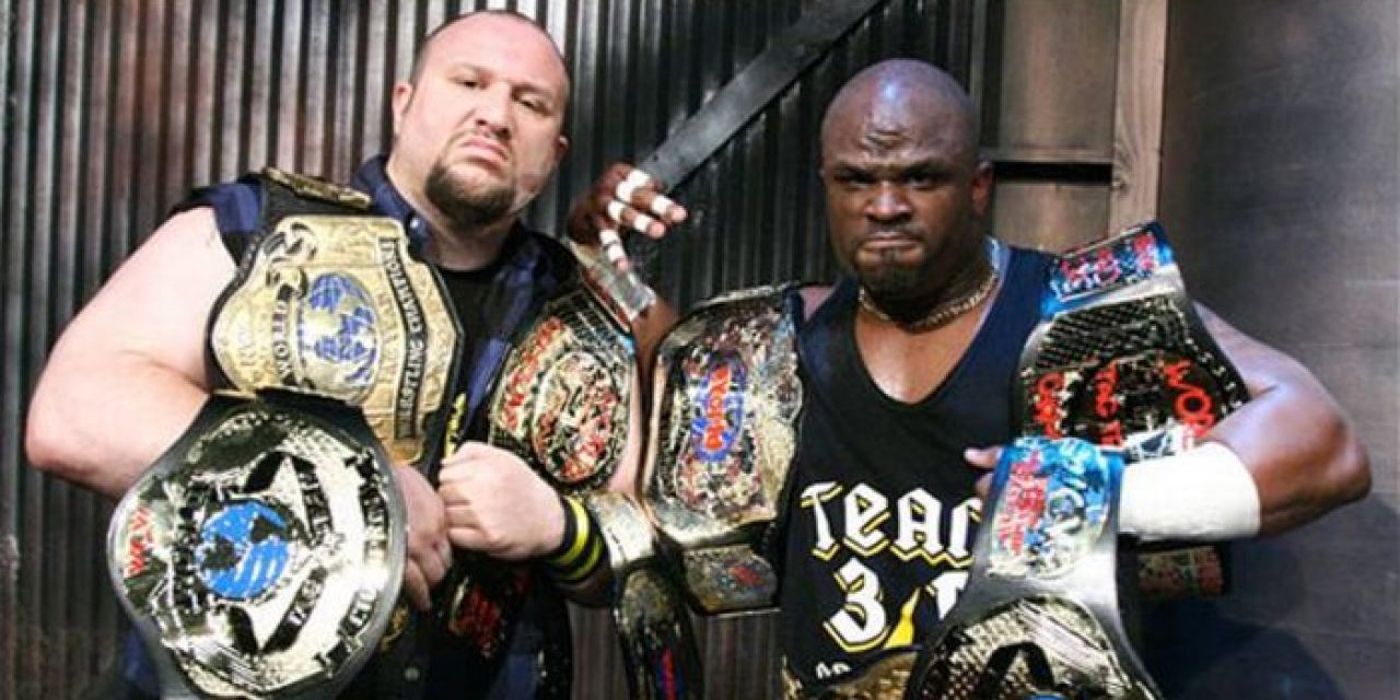 The Dudley Boyz showing off their titles