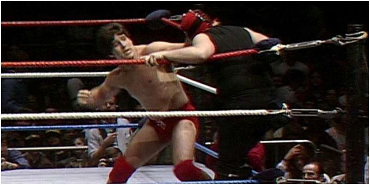 WWE Tito Santana Throwing A Punch At The Executioner